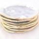 Handmade ceramic breakfast appetizer plate in white with a wash of watercolor glaze adorned with 22K gold edges
