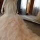 Inspired designer blush ruffled mermaid wedding dress