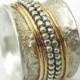 Wide wedding ring, wide rotating ring with four yellow gold spinner hoops, two silver ball hoops, chunky, makes a statement, Ilan Amir