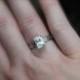 moissanite engagement ring . unique emerald cut solitaire engagement ring . diamond alternative engagement ring . 14k palladium white gold