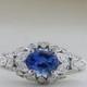 Striking Blue Oval Ceylon Sapphire and Diamond Floral Ring in White Gold Size 6.5