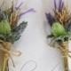 Rustic Buttonhole, Boutonniere - Country Garden style buttonhole, wheat, thistle and lavender wildflowers.  Groom, groomsmen wedding flowers