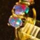 The Perfect engagement ring.Genuine Australian Opal ring.Three Australian Opals in 14K or a Sterling Silver setting.