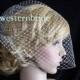 Best seller On Sale Ivory Birdcage veil . Full veil made with Russian net . With comb ready to wear.