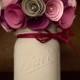 Rustic shades of purple paper flower bouquet in a hand painted grey mason jar!