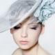 Sinamay saucer with double full blown silk rose spray and veiling perfect for a wedding/ the Melbourne Cup.