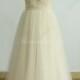 Cream/light champagne a line tulle wedding dress with cap sleeves