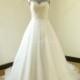 Open back white a line wedding dress with elegant beads - Hand-made Beautiful Dresses