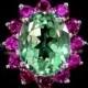 A Vintage 3.6CT Oval Cut Green Tourmaline & Ruby Ring