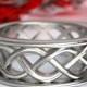 Celtic Wedding Ring With 3 Cord Braided Knotwork Encased in Rails Design in Sterling Silver, Made in Your Size CR-271