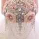 Champagne vintage brooch bouquet. Cascading beige cream silver jeweled bridal wedding broach boquet. Pearl crystal cascades bouquet