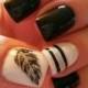 Black And Glittery Feather Nail Art