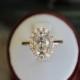 3.00 Carat Oval Moissanite & Diamond Flower Shared Prong Halo Engagement Ring 14k Rose Gold, 11x7mm Harro Moissanite Engagement Rings - $2975.00 USD