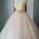 Classic blush pink tulle ball gown wedding dress