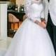 H1022 Modest long sleeved lace ball gown wedding dress