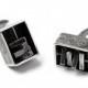 title of work Encased Spinner Cuff Links 