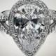 A Perfect 7CT Pear Cut Russian Lab Diamond Split Shank Engagement Ring