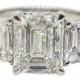 Rectangular 4.64 Carats Emerald Cut Three Stone Platinum Ring