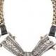 Statement Necklace By Lanvin. Ridged Curb Link Chain. Calf Leather Trim. Crystal-embellished Bow Detail At Center. Adjustable Push-stud Closure. 