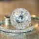 This Halo Diamond Wedding Ring Set Showcases A Halo Engagement Ring With A 8x8mm Round Shaped Natural White Topaz Cr… 