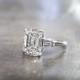 HALLE Is A Custom, Three Stones Engagement Ring Set In Platinum With An Emerald Cut Diamond And Two Tapered Baguettes, From Jewelry D… 