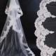 mantilla cathedral lenght bridla veil colors white, ivory and champagne. lace veil