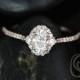 Rosados Box Bridgette 6x4mm 14kt Rose Gold Oval F1- Moissanite and Diamonds Halo Engagement Ring