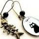Ovale Earrings Cat and fishbone, bronze and glass.