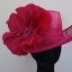 Magenta irregular shaped feature hat with silk poppy-- Style name Poppy Made to Order