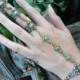elfin hand chain,peridot slave bracelet,green,full finger ring,hand flower,poison ivy,cosplay,festival,boho,victorian ,moon goddess , gypsy