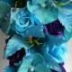 Turquoise blue and royal purple bouquet , roses , lilies and orchids 4 pieces