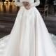 A line wedding dress Olivia by Olivia Bottega. Wedding dress off the shoulder