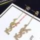Saint Laurent Vintage YSL Chain Earrings In Crystal Brass Gold
