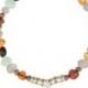 Baltic amber bracelet wtih faceted glass