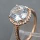 AAA Aquamarine Natural Untreated   9.0mm  2.14 Carats   14K Rose gold and diamond Engagement Halo ring 2011R