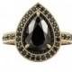 2 Ct Pear Cut Diamond Ring With Black Diamond Halo