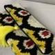 Velvet fabric ikat clutch purse; white, black color with yellow tassel
