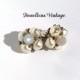 Elegant Vintage Faux Pearl & Silver Filigree Clip On Earrings presented by Donellensvintage