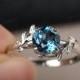 London blue topaz ring twig engagement ring round gemstone leaves around ring in white gold