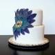 White Fondant Special Wedding Cake With Feathers 