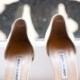 Feathery white high heel wedding shoes