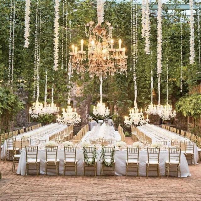 wedding celebration venue decorated with chandeliers