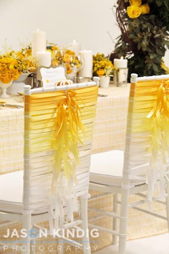 wedding photo - Take Several Seats With These Stylish Wedding Chair Covers
