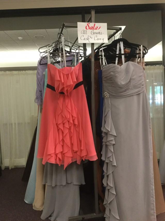 wedding photo - all gowns on sale rack are cash and carry