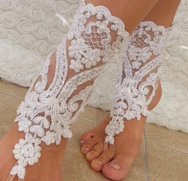 ivory-beach-wedding-barefoot-sandals.jpg