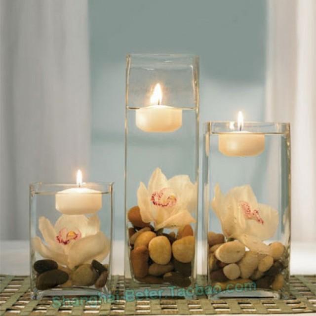 BETER-LZ000 These Neutral Floating Candles will add a romantic touch to your wedding. Use these candles with centerpieces or in votive holders to create the atmosphere that you have been looking for.