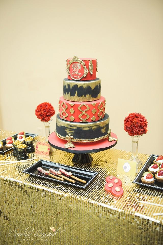 wedding photo - Elegant Red black and gold wedding cake