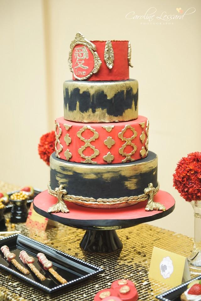 wedding photo - Red black and gold wedding cake