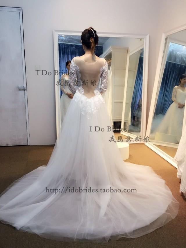 wedding photo - sheer back long sleeves mermaid ball gown wedding dress