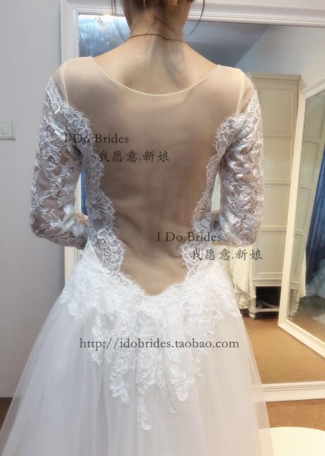 wedding photo - sheer back long sleeves mermaid ball gown wedding dress